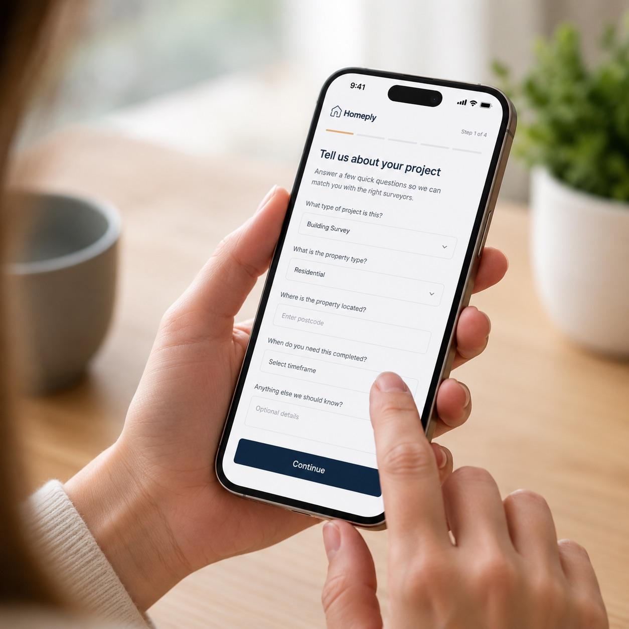 Homeowner filling in the Homeply quote form on their phone